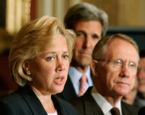 Democratic senator Mary Landrieu speaks alongside Harry Reid and John Kerry in Washington.